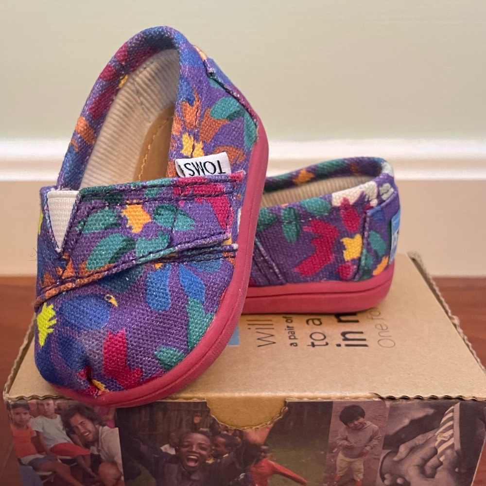 TOMS baby girl flats, size 2